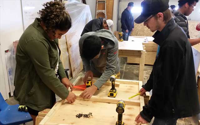 A Group of build pagosa students working on a project.